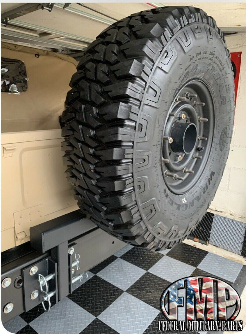 Swing away military Humvee tire carrier mounts on rear bumper – Federal ...